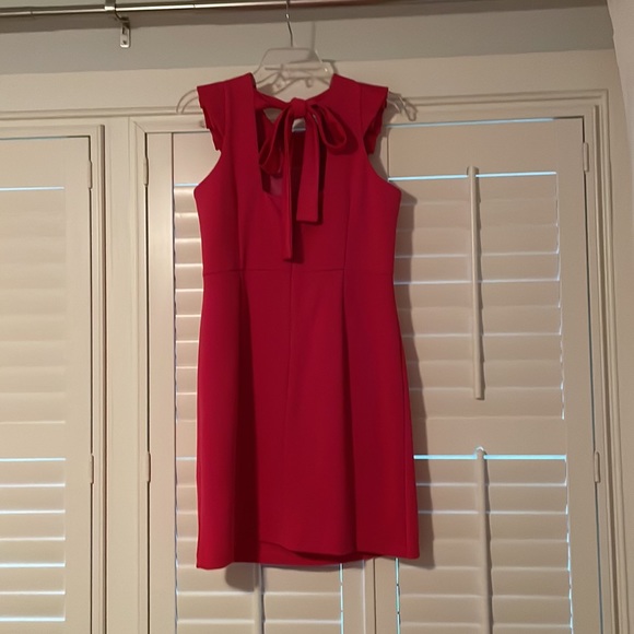 95% polyester 5% spandex ruffle sleeve detail and square back with tie - Picture 3 of 3